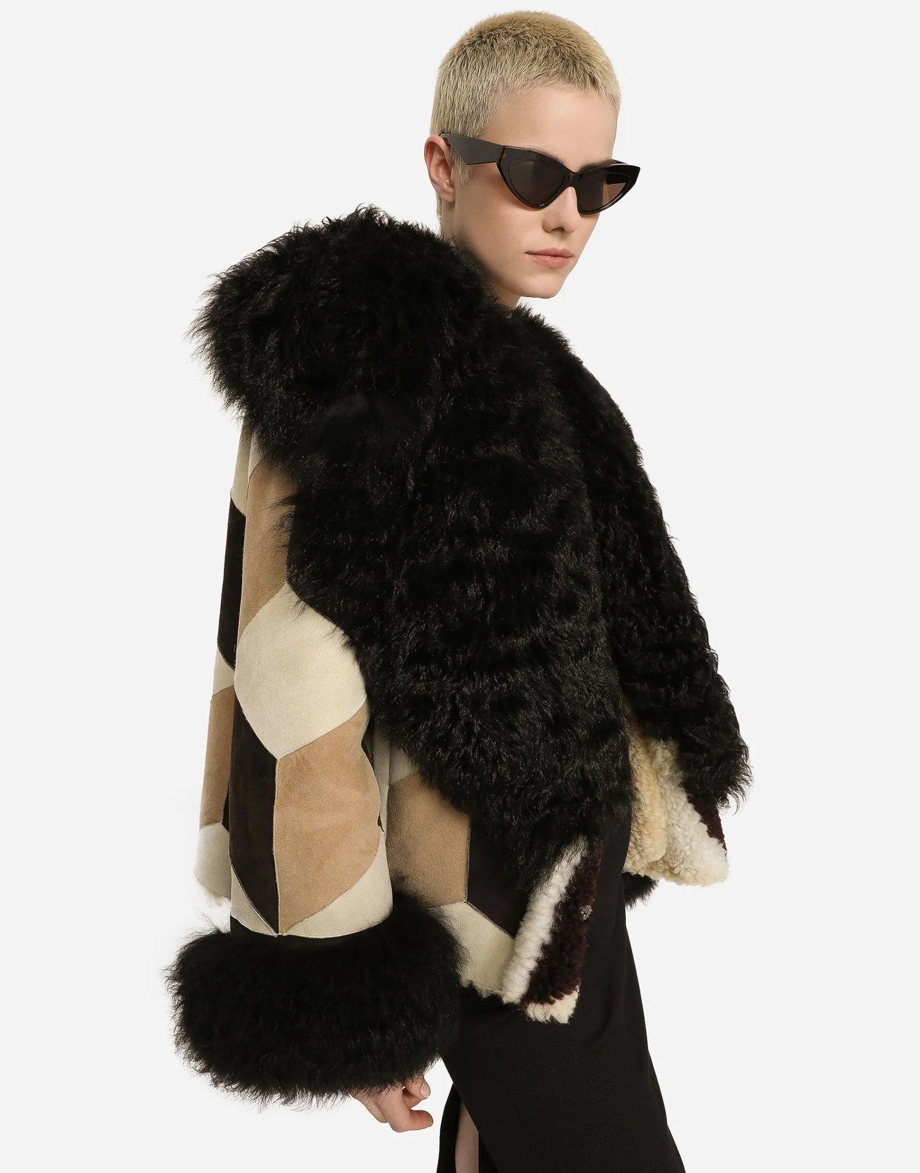 Short heavy jacket in sheepskin patchwork