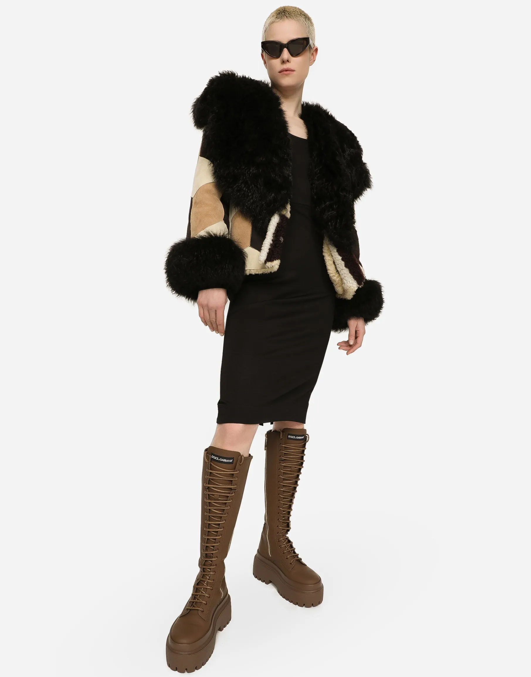 Short heavy jacket in sheepskin patchwork