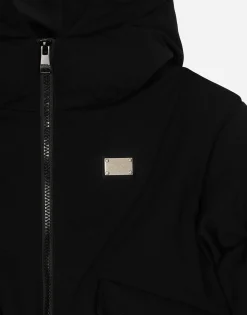 Short jersey down jacket with branded tag