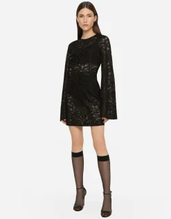 Short lace-stitch dress with full sleeves