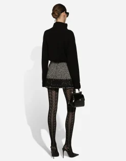 Short micro-tweed skirt with lace insert