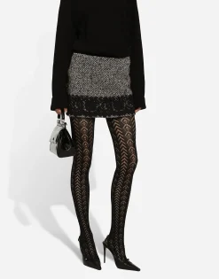 Short micro-tweed skirt with lace insert