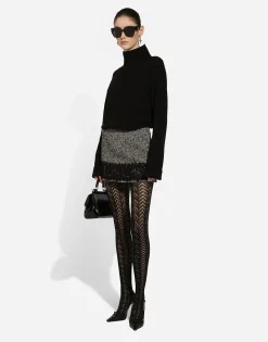 Short micro-tweed skirt with lace insert
