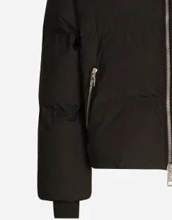Short nylon down jacket with branded tag
