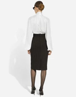 Short straight-cut pinstripe wool skirt