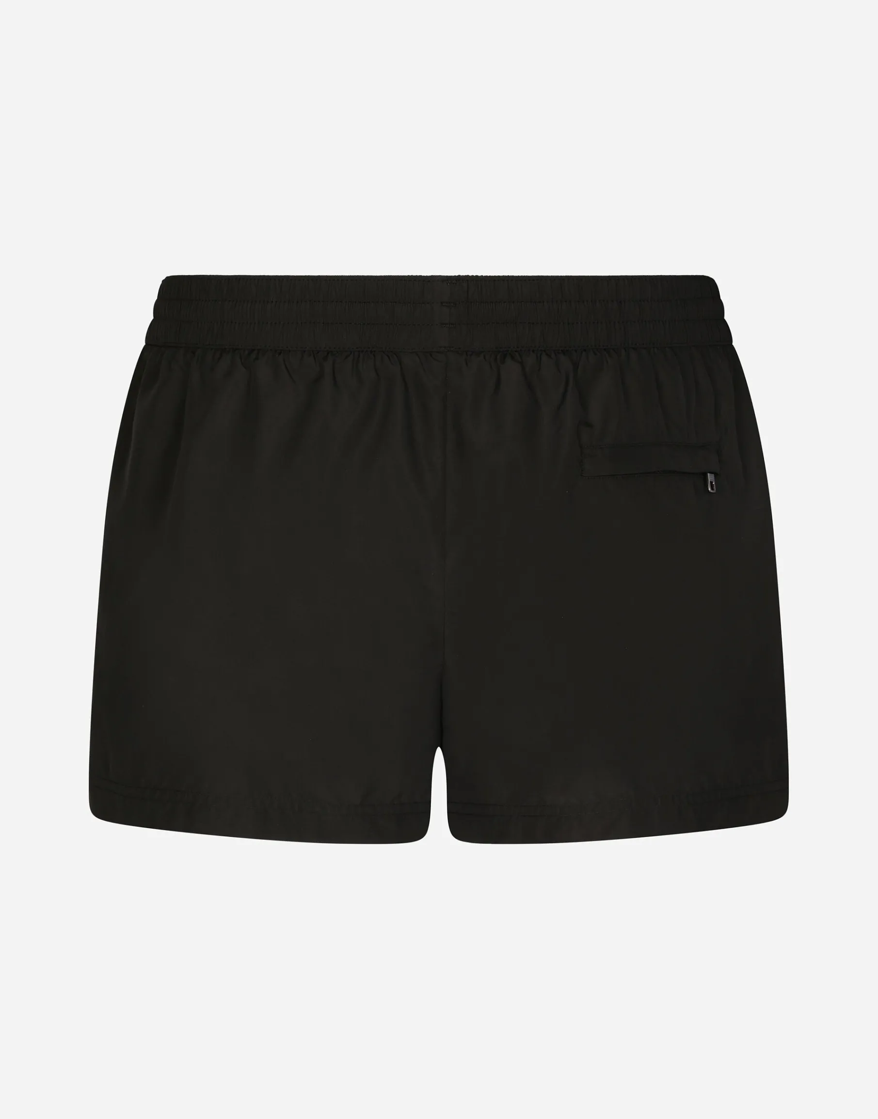 Short swim trunks with branded tag