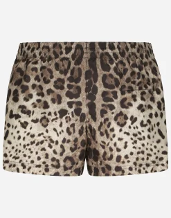 Short swim trunks with leopard print