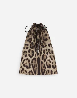 Short swim trunks with leopard print