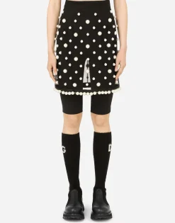 Short tulle skirt with pearl embellishment
