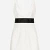 Short woolen dress with satin belt and straps