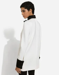 Short woolen dress with satin details