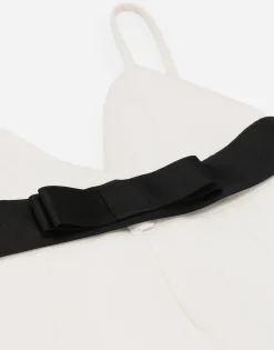 Short woolen dress with satin belt and straps