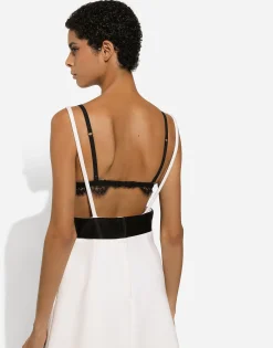 Short woolen dress with satin belt and straps