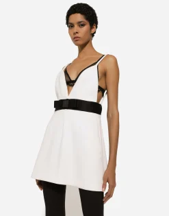 Short woolen dress with satin belt and straps