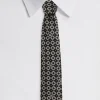 Silk jacquard tie with DG logo