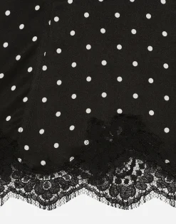 Silk lingerie-style top with polka-dot print and lace detailing