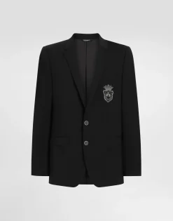 Single-breasted wool Martini-fit suit with heraldic emblem