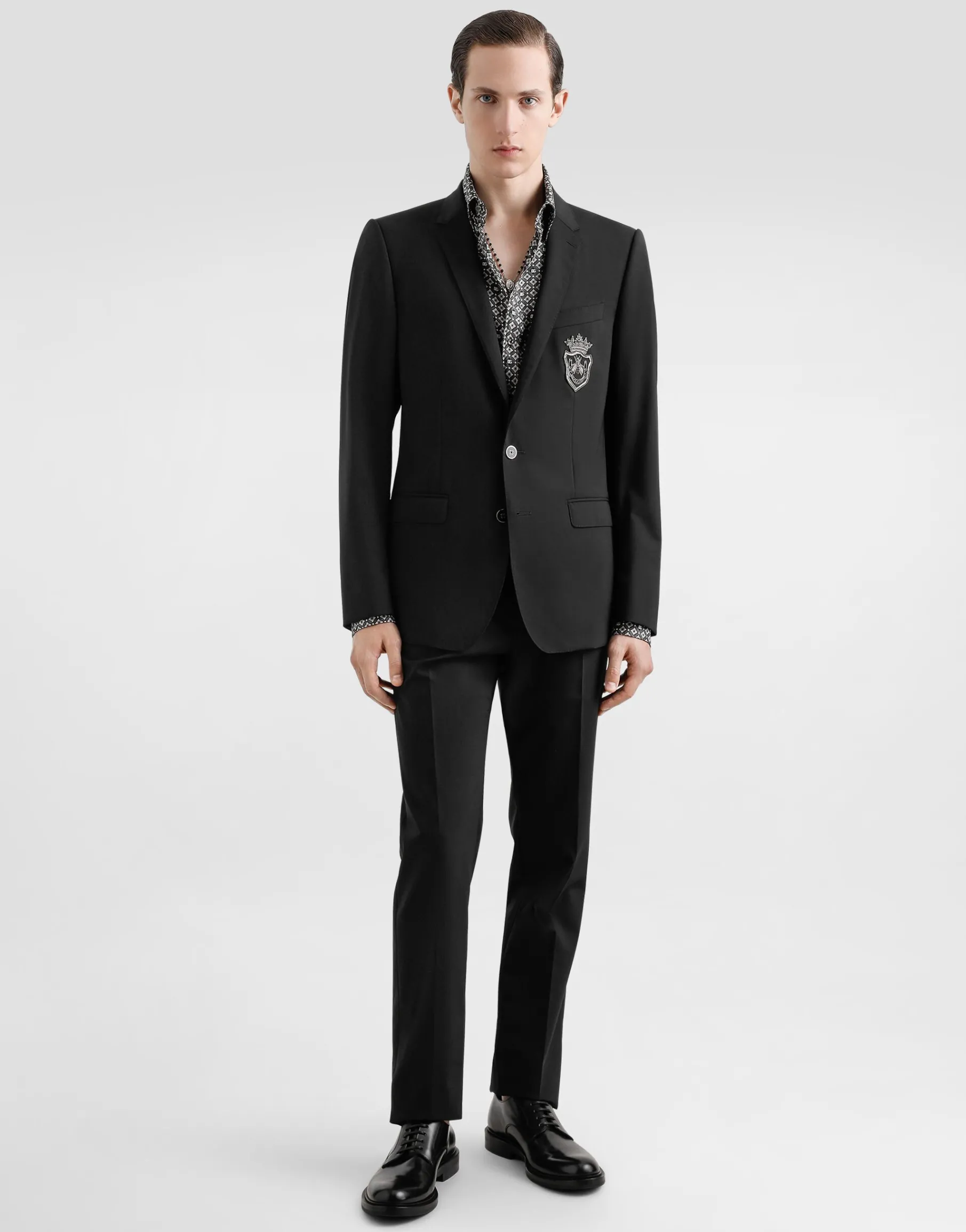 Single-breasted wool Martini-fit suit with heraldic emblem