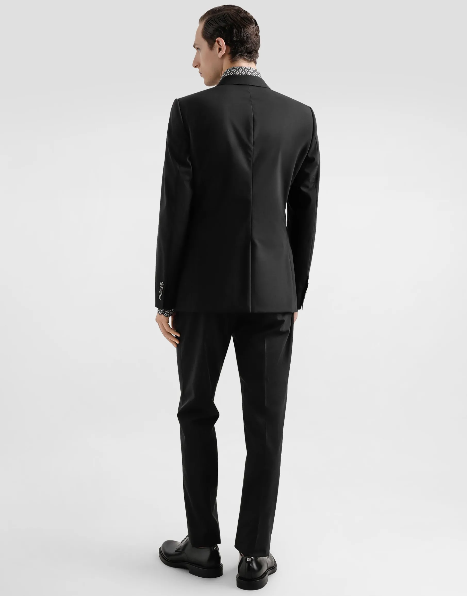 Single-breasted wool Martini-fit suit with heraldic emblem