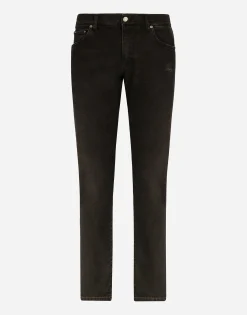 Slim fit stretch denim jeans with subtle abrasions