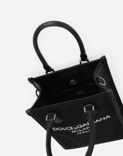 Small nylon bag with rubberized logo