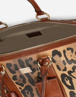 Small travel bag in leopard-print Crespo with branded plate