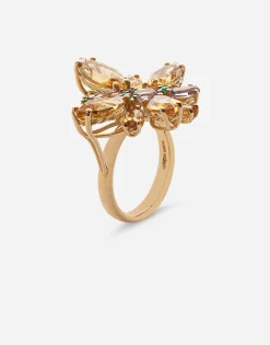 Spring ring in yellow 18kt gold with citrine butterfly