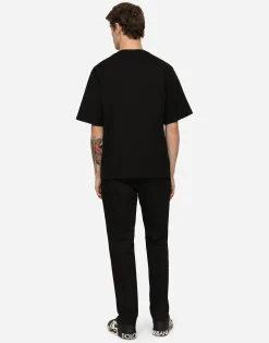 Stretch cotton jogging pants with plate