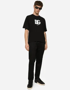 Stretch cotton jogging pants with plate