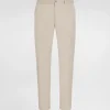 Stretch cotton pants with branded tag