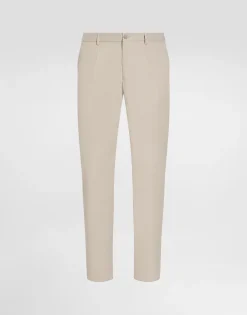 Stretch cotton pants with branded tag