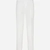 Stretch cotton pants with branded tag
