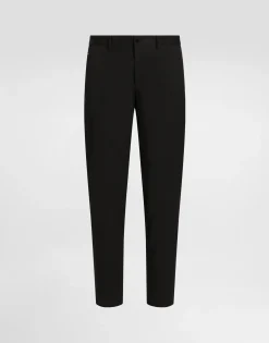 Stretch cotton pants with branded tag