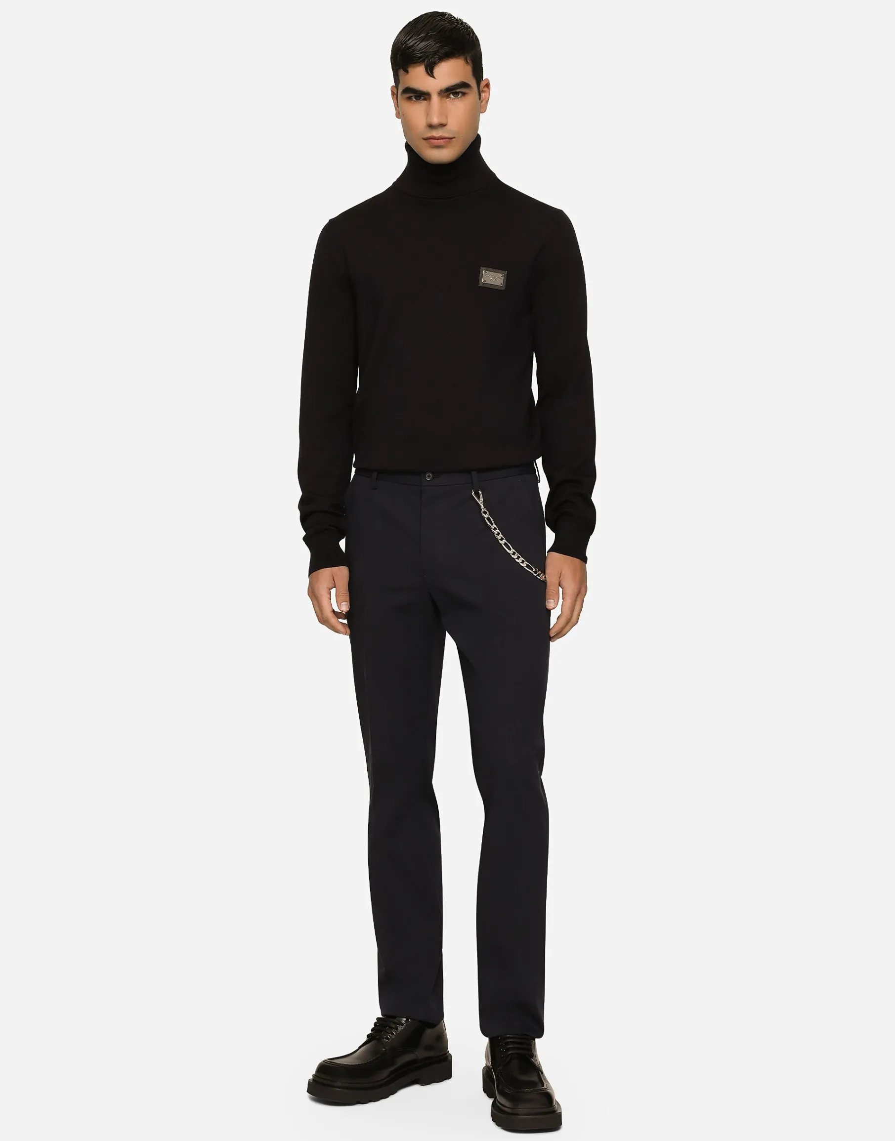 Stretch cotton pants with branded tag