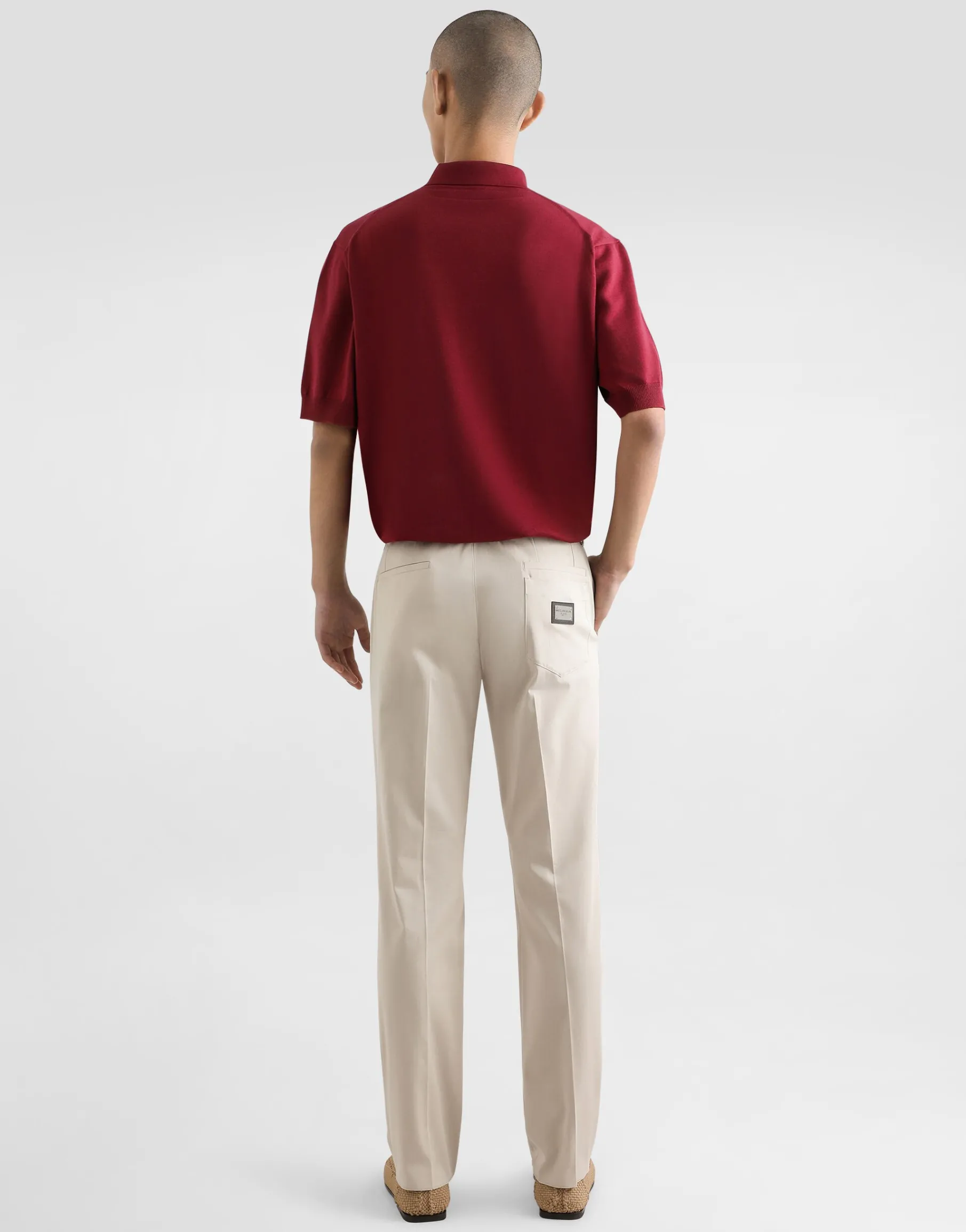 Stretch cotton pants with branded tag
