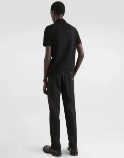 Stretch cotton pants with branded tag