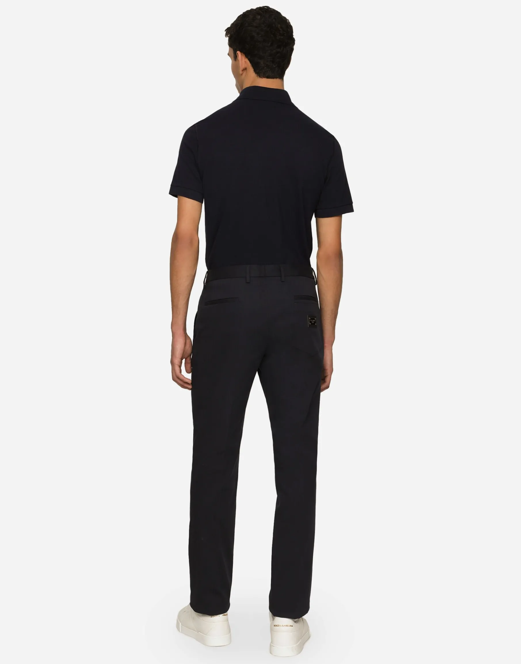 Stretch cotton pants with branded tag