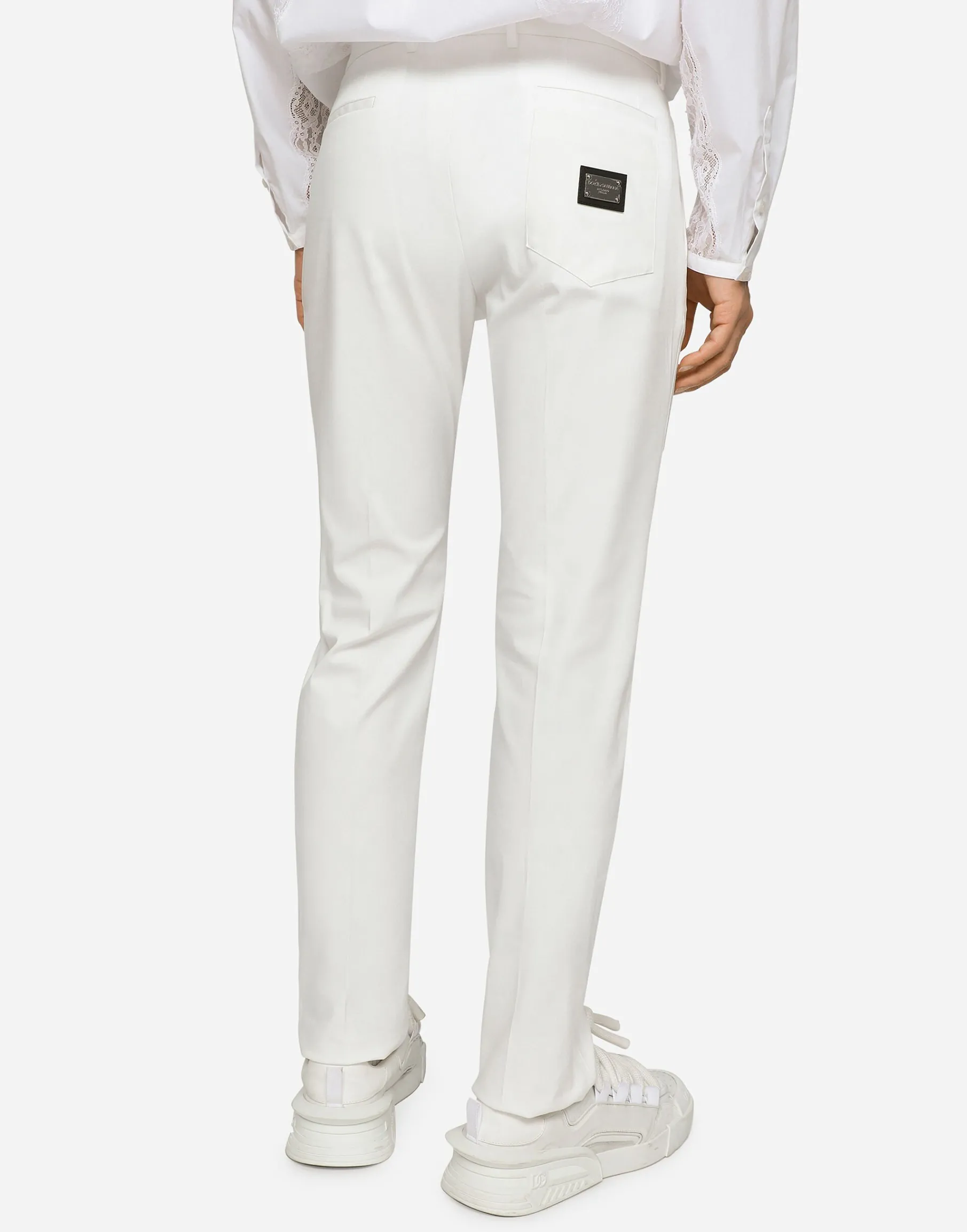 Stretch cotton pants with branded tag