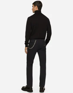 Stretch cotton pants with branded tag