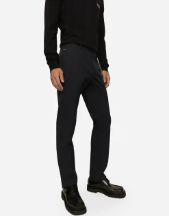 Stretch cotton pants with branded tag
