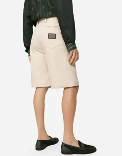 Stretch cotton shorts with branded tag