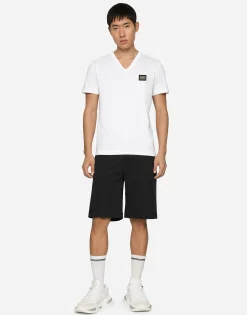 Stretch cotton shorts with branded tag