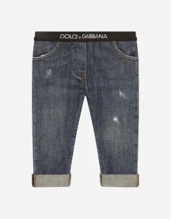 Stretch denim jeans with branded elastic