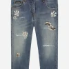 Stretch denim jeans with bejeweled embellishment