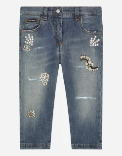 Stretch denim jeans with bejeweled embellishment