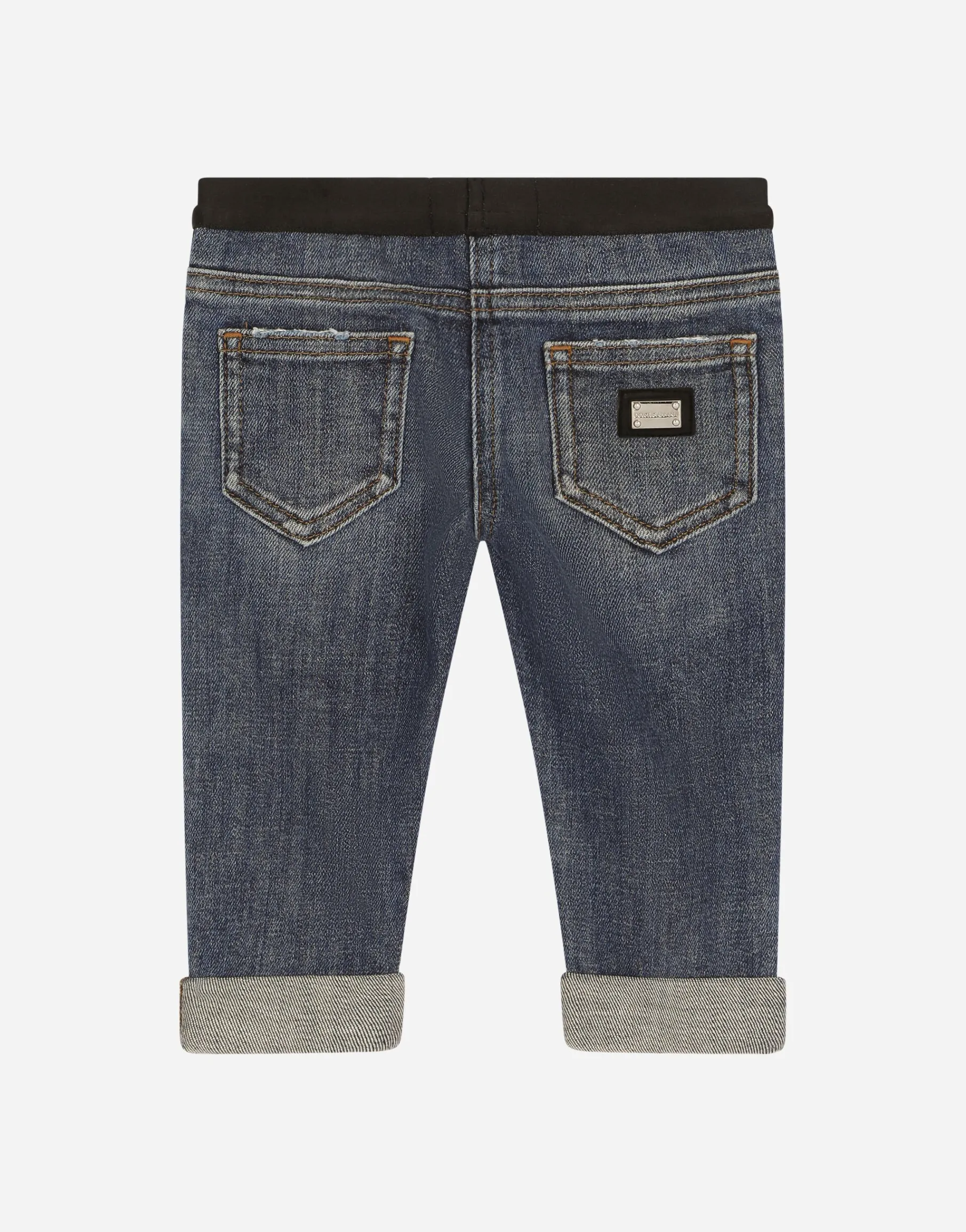 Stretch denim jeans with branded elastic