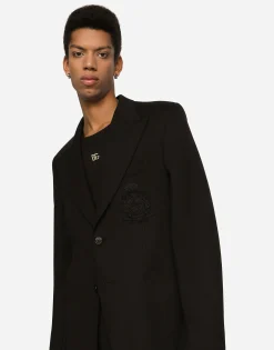 Stretch jersey jacket with heraldic patch