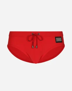 Swim briefs with high-cut leg and branded tag