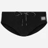 Swim briefs with high-cut leg and branded tag