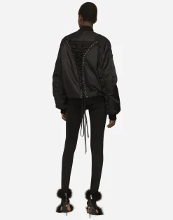Technical fabric bomber jacket with laces and eyelets